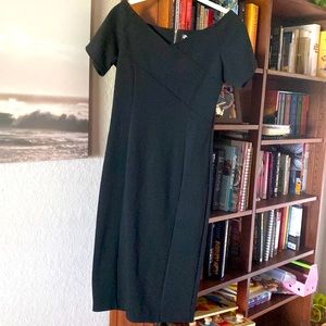 Black bodycon dress with cross cross detail